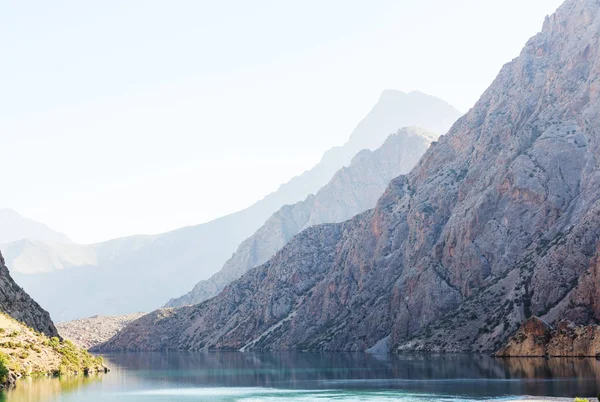 Beautiful serene lake in  Fanns mountains (branch of Pamir) in Tajikistan.