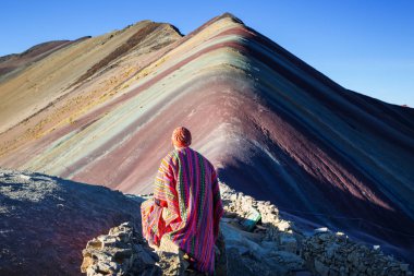 Hiking scene in Vinicunca, Cusco Region, Peru. Montana de Siete Colores,  Rainbow Mountain. clipart