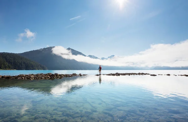 Hike to turquoise waters of picturesque Garibaldi Lake near Whistler, BC, Canada. Very popular hike destination in British Columbia.