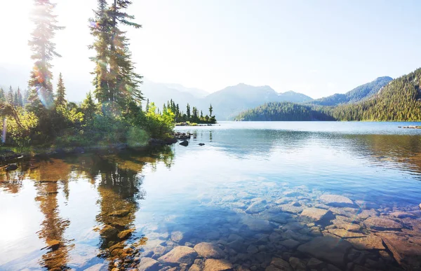 Hike to turquoise waters of picturesque Garibaldi Lake near Whistler, BC, Canada. Very popular hike destination in British Columbia.