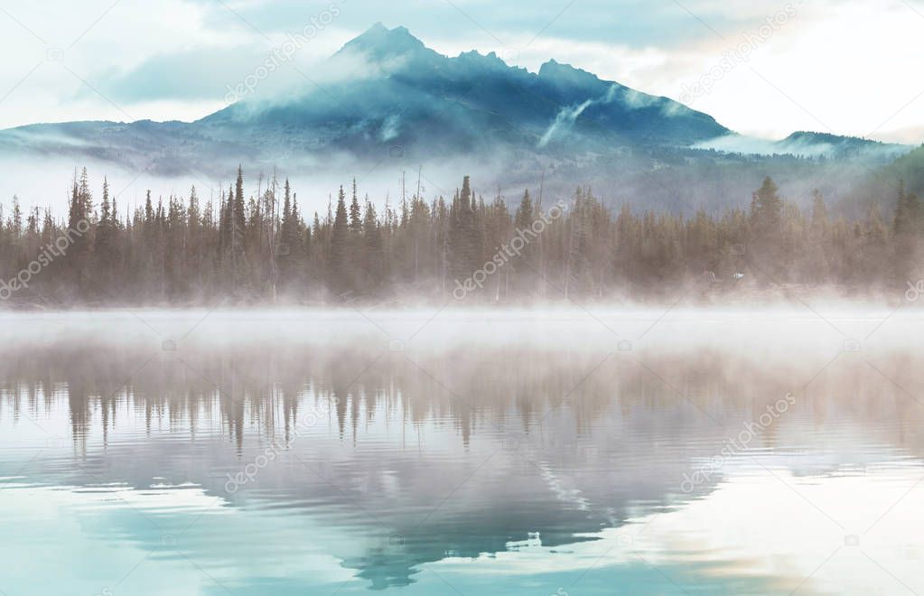 Serene beautiful lake in morning mountains, Oregon, USA.