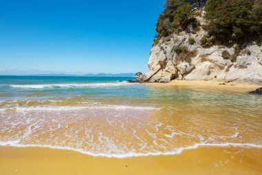 Ocean Beach, Yeni Zelanda 'da güzel bir gün batımı. İlham verici doğal ve seyahat geçmişi