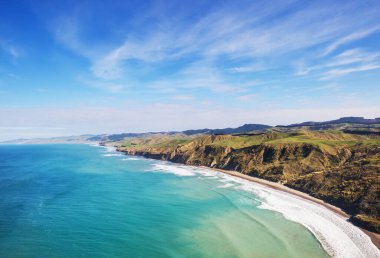 Ocean Beach, Yeni Zelanda 'da güzel bir gün batımı. İlham verici doğal ve seyahat geçmişi