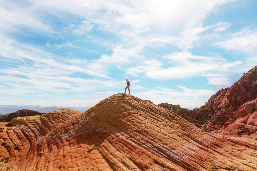 Hike in the Utah mountains. Hiking in unusual natural landscapes. Fantastic forms sandstone formations.