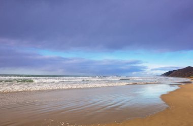 Ocean Beach, Yeni Zelanda 'da güzel manzaralar var. İlham verici doğal ve seyahat geçmişi