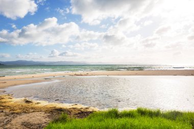 Ocean Beach, Yeni Zelanda 'da güzel manzaralar var. İlham verici doğal ve seyahat geçmişi