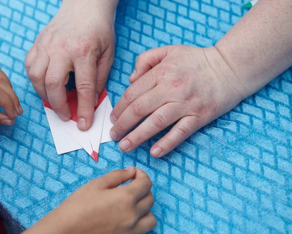 Оригами бумажный пенсионер — стоковое фото