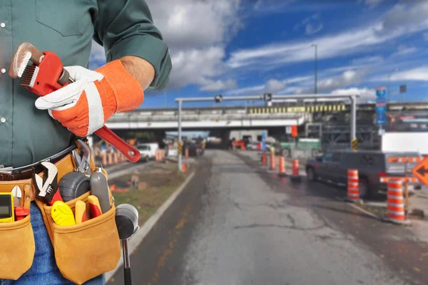 Mature worker and road repair — Stock Photo, Image