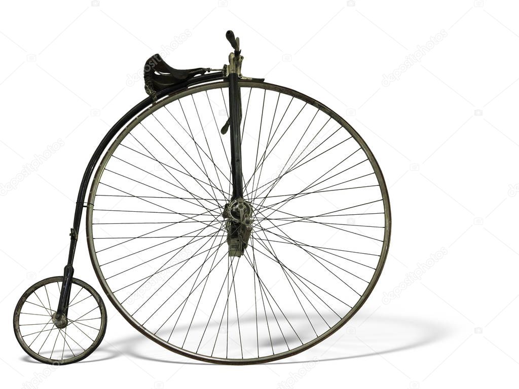 Vintage old retro bicycle isolated over white background