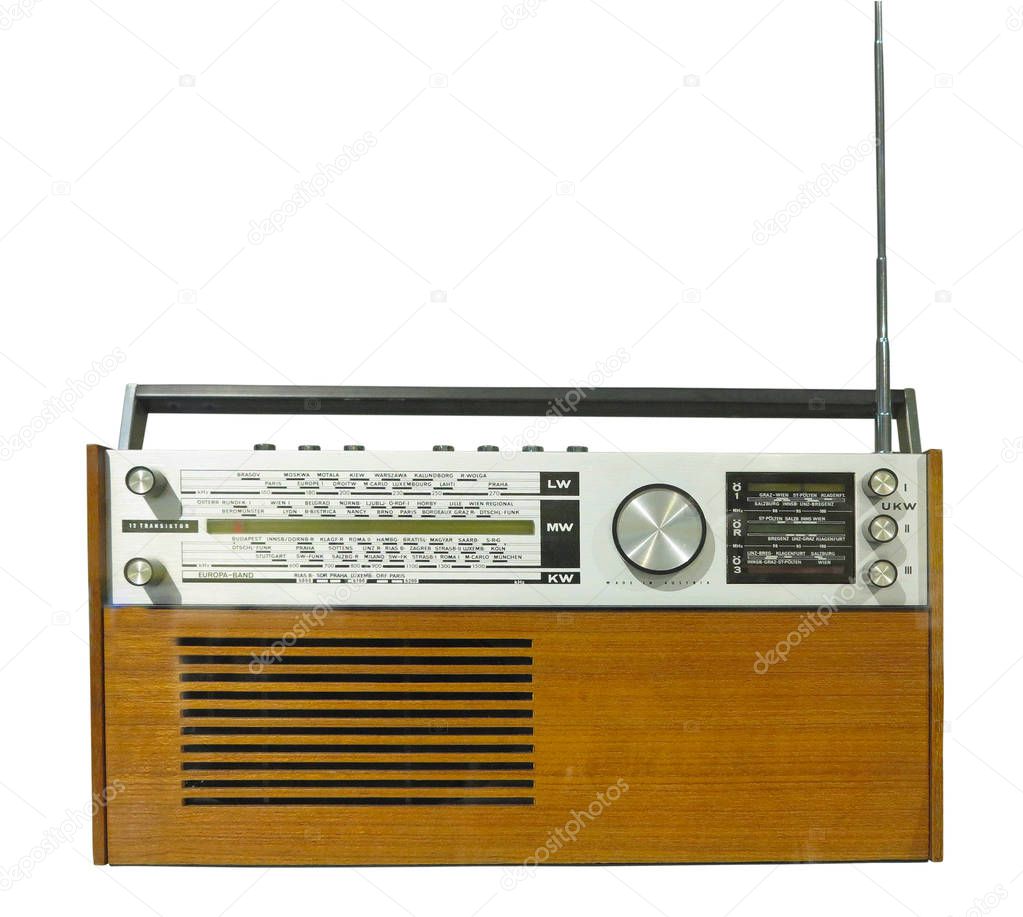 Vintage wooden old radio receiver isolated over white background