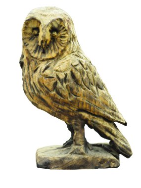 Baykuş heykeli oyulmuş eski ahşap bir heykel. Büyük gözleri yalıtılmış.