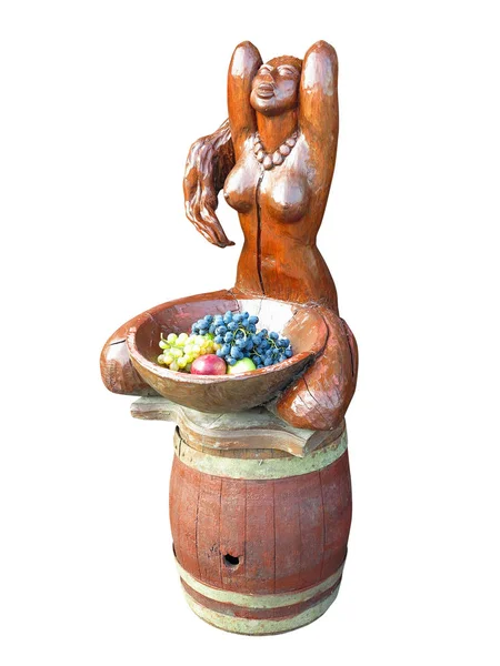 Brązowy drewniana kobieta rzeźba na jęczmień z crapes i jabłko sta — Zdjęcie stockowe