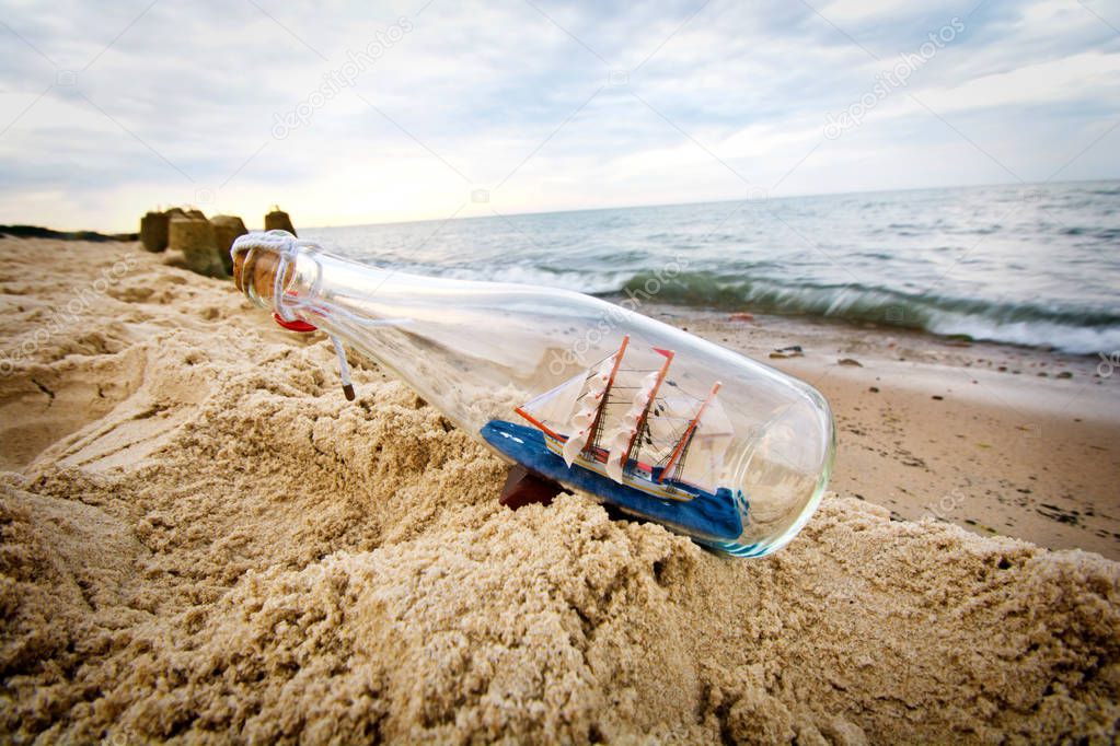 Bottle with ship inside.