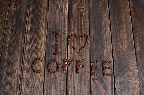 Słowo I "Love Coffee" wykonane z ziaren kawy — Zdjęcie stockowe
