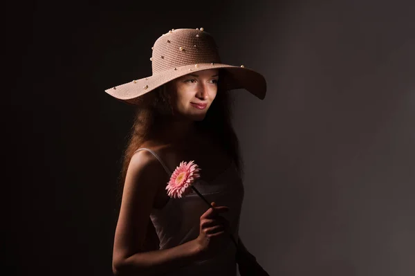 Portrait of pretty woman in pink hat — Stock Photo, Image