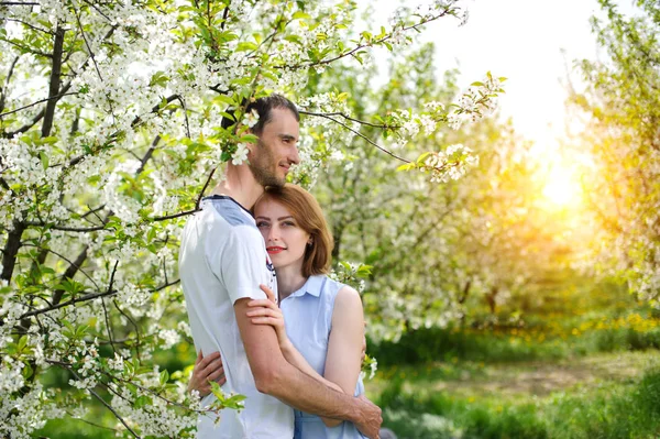 Young couple in the garden — Stock Photo, Image