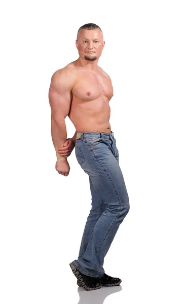 Obrázek svalnatého muže pózujícího ve studiu — Stock fotografie
