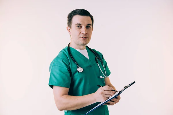 Joven Doctor Uniforme Posando Estudio —  Fotos de Stock