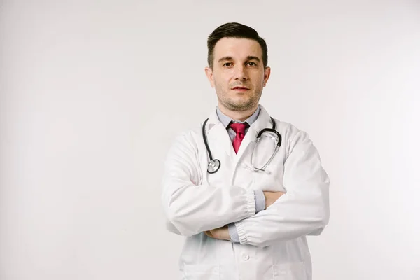 Mladý Muž Lékař Uniformě Pózování Studiu — Stock fotografie