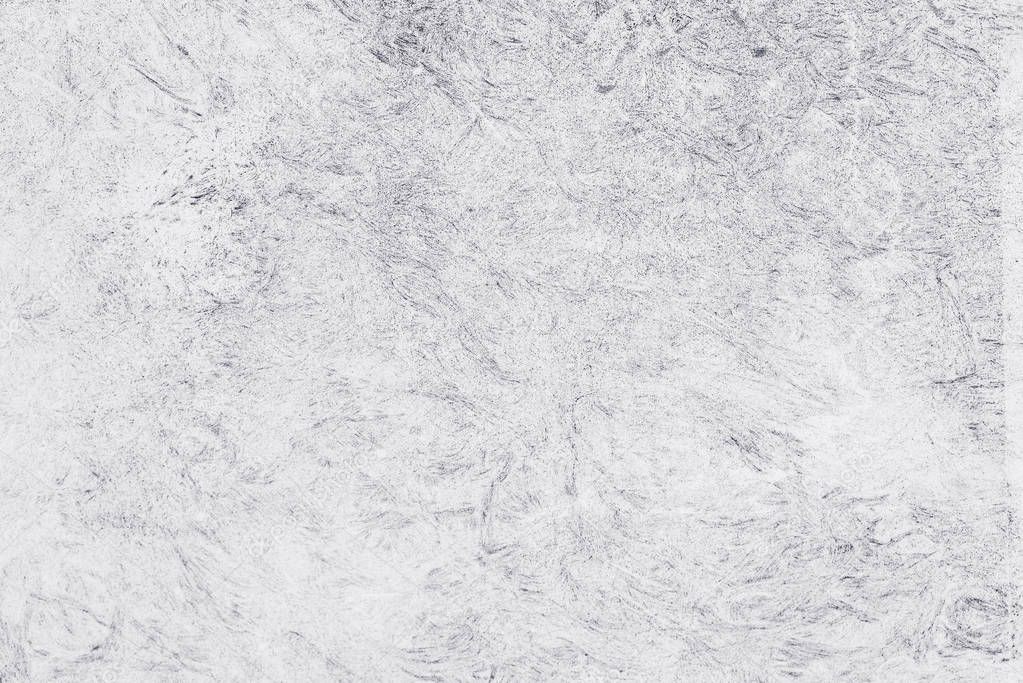 Bright white grunge distressed textured surface as background