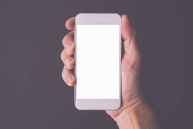 El, bir smartphone alay ekran kopya alanı, hareket eden telefon aygıt tutan adam