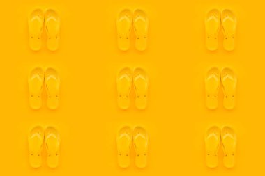 Aynı renk arka plan üzerinde Dikişsiz desen arka plan sarı Flip floplar. Plaj sandaletleri ya da terlik minimalist sıcak yaz aylarında kompozisyon tonda.