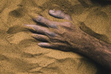 El ölü kişinin kum, kavramsal görüntüde gömülü