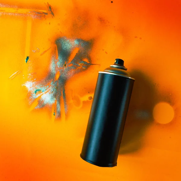 Black Color Spray Can Graffiti Artwork Grunge Yellow Background — Stock Photo, Image