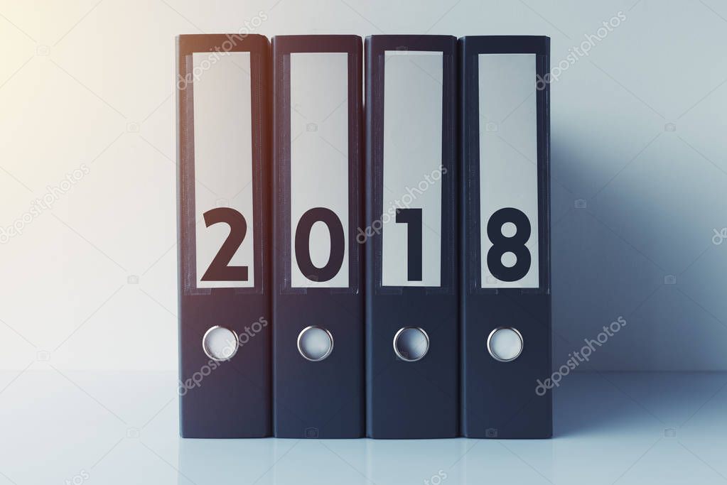Archive documents ring binders with number 2018 for fiscal business year