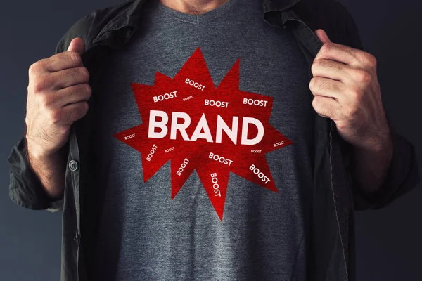 Brand Boosting Concept Handsome Guy Showing Shirt Text Mock — Stock Photo, Image