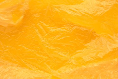 Sarı plastik torba doku çevre kirliliği kavramı için arka plan olarak