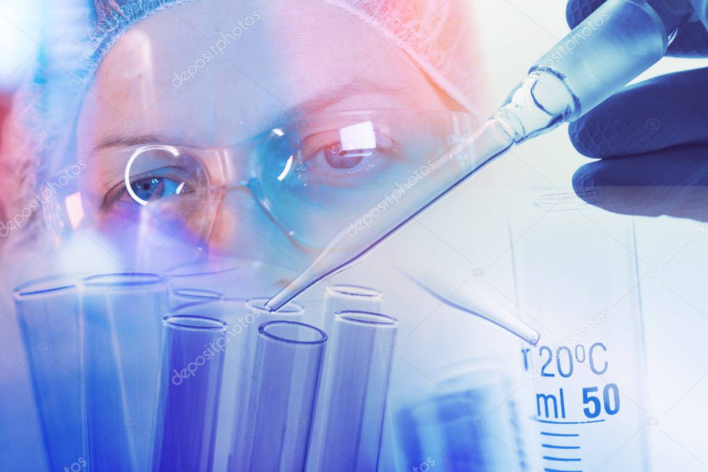 Medical scientist working with laboratory glassware, conceptual image of scientific equipment for researching in medicine and chemistry