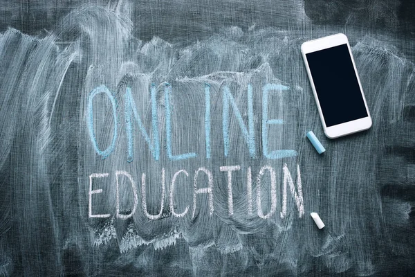 Online Education Concept Smartphone Dirty Blackboard Surface — Stock Photo, Image