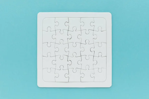 Komplettes Leeres Puzzle Als Kopiervorlage Oberflächenansicht Auf Blauem Hintergrund — Stockfoto