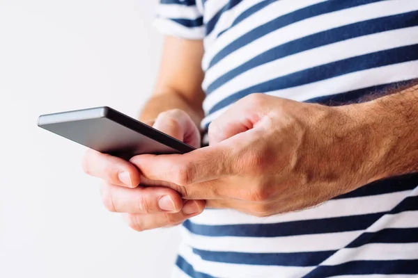 Man Striped Nautical Sailor Shirt Using Mobile Phone Close Hands — Stock Photo, Image