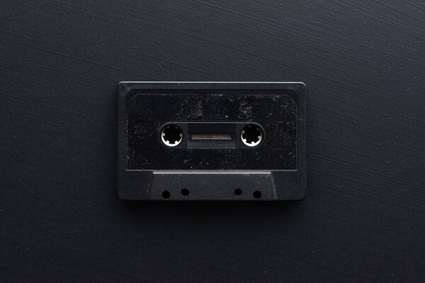 Old Black Dirty Audio Cassette Dark Background — Stock Photo, Image