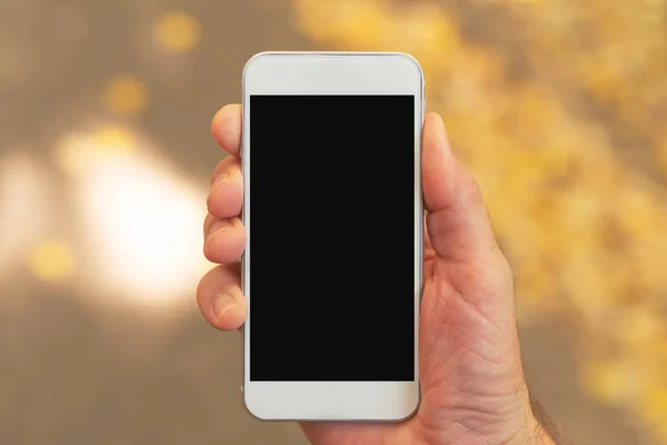 Smartphone Mannenhand Mock Scherm Met Gele Herfst Achtergrond — Stockfoto