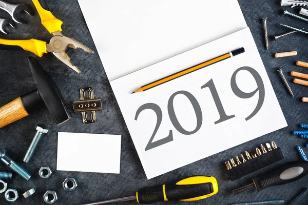 2019 New Year Resolutions Notebook Assorted Diy Tools — Stock Photo, Image