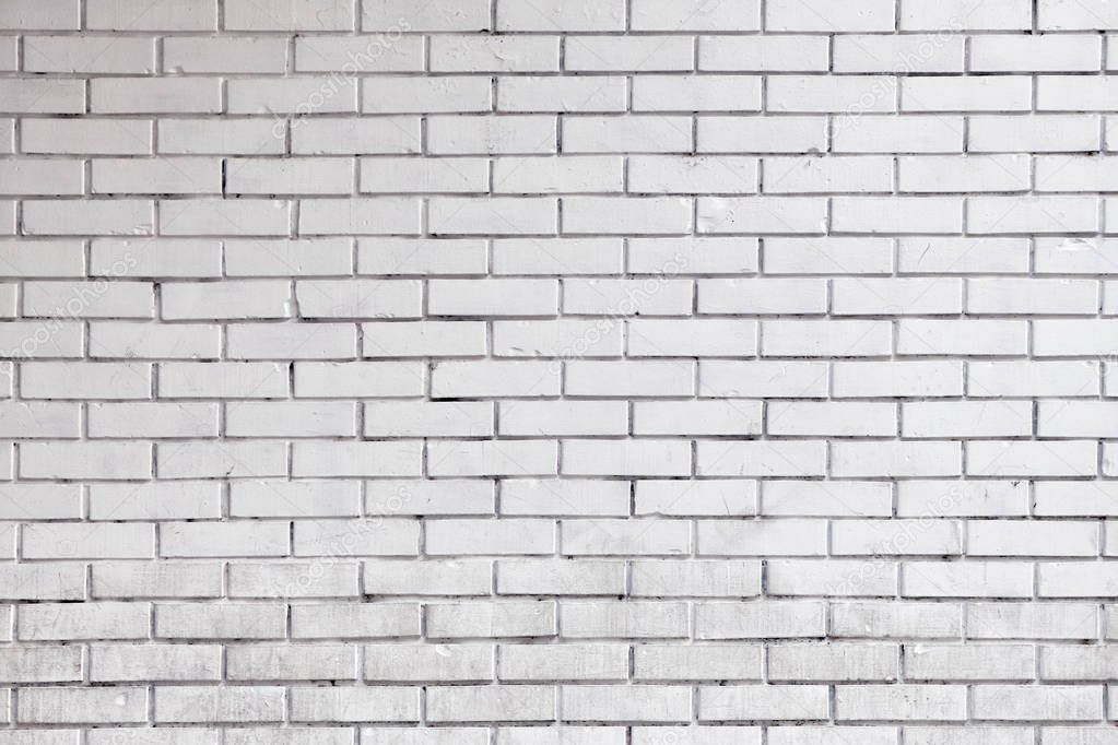 White brick wall surface as urban texture background