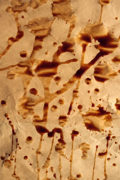 咖啡滴水 污渍和飞溅的棕色纸 顶部视图 — 图库照片