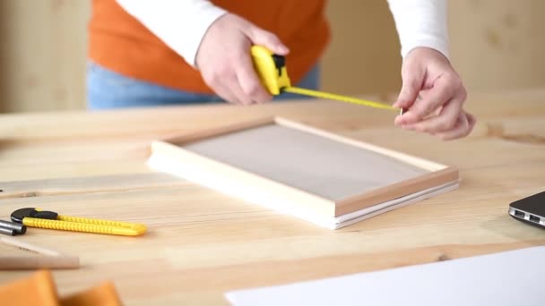Female Carpenter Tape Measuring Picture Frame Small Business Woodwork Workshop — Stock Video