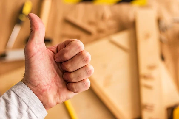 Carpenter is gesturing thumbs up — Stock Photo, Image