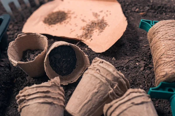 Biodegradable cardboard pot containers for plant soil