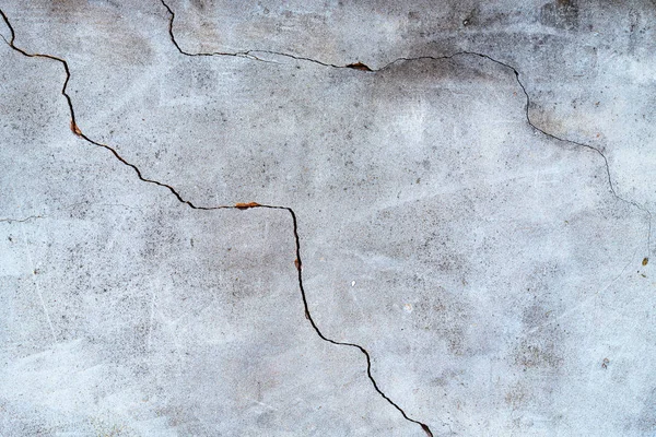 Gebarsten betonnen wand achtergrond — Stockfoto