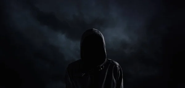 Spooky hooded person with obscured face — Stock Photo, Image
