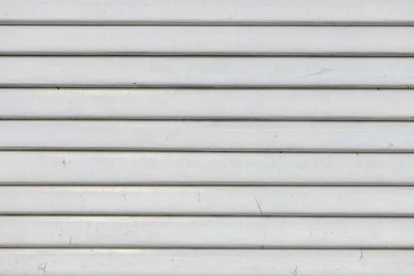 Witte vintage houten planken in overlapping bekleding patroon — Stockfoto