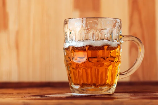 Beer jug on bar counter — Stock Photo, Image