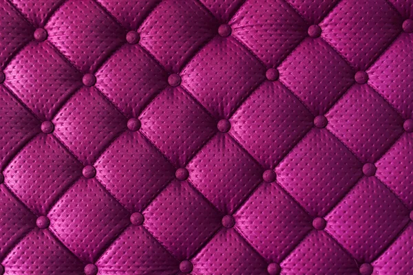 Vibrant synthetic leather material with button pattern — Stock Photo, Image