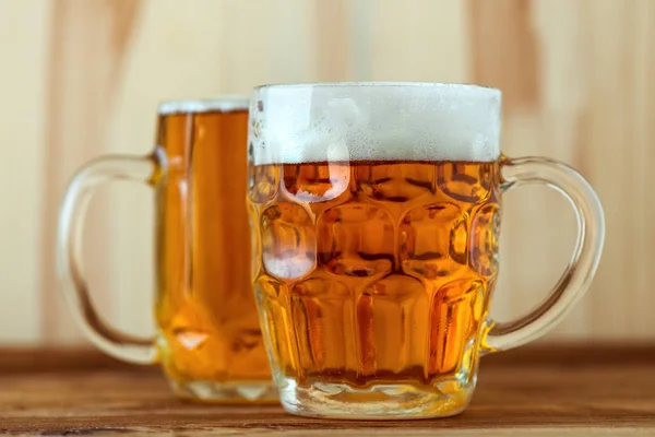 Two full jugs of beer on bar counter — Stock Photo, Image