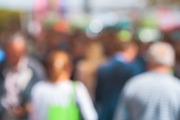 Elderly people as blur street crowd — Stock Photo, Image